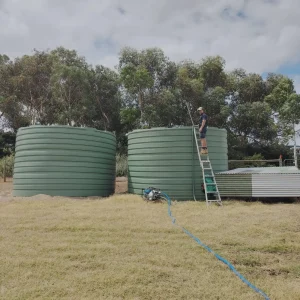 Tank Care SA Technician performing professional Rainwater Tank Cleaning Tank Care SA Technician performing professional Rainwater Tank Cleaning